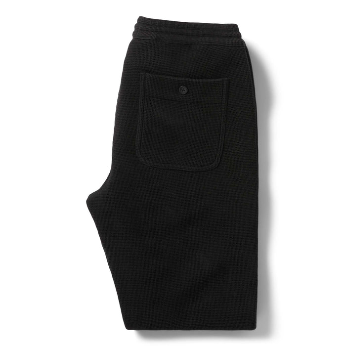 flatlay of the back of The Apres Pant in Coal Waffle folded