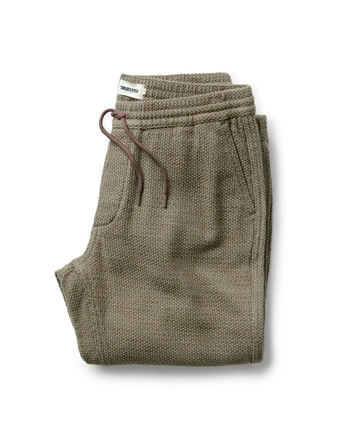 folded flatlay of The Apres Pant in Cypress Sashiko