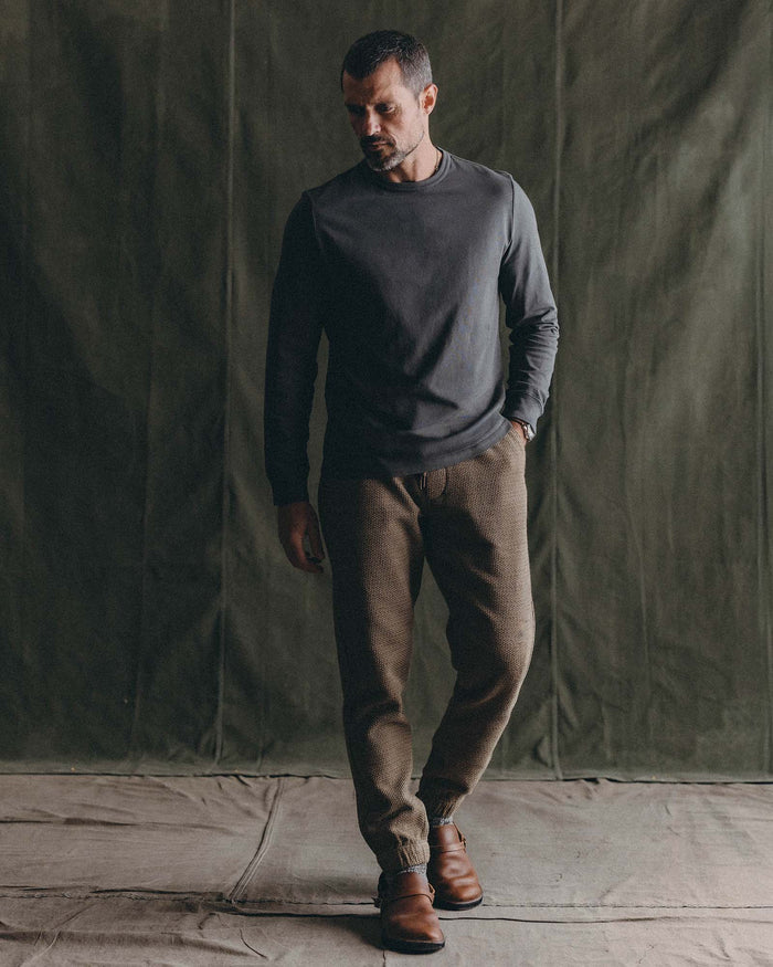 fit model walking wearing The Apres Pant in Cypress Sashiko