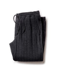 folded flatlay of The Apres Pant in Heather Coal Quilted Jersey