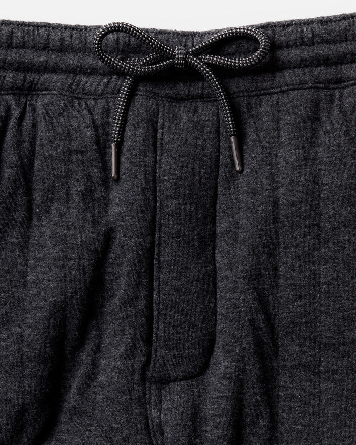 material shot of the waistband on The Apres Pant in Heather Coal Quilted Jersey