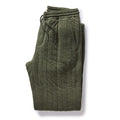 folded flatlay of The Quilted Apres Pant in Heather Fatigue Olive Jersey