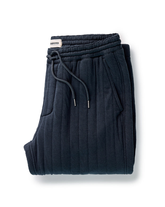 folded flatlay of The Quilted Apres Pant in Heather Midnight Jersey