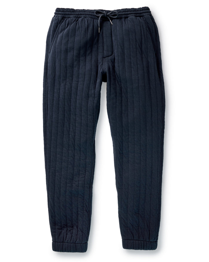 fit model showing cuffs on The Quilted Apres Pant in Heather Midnight Jersey