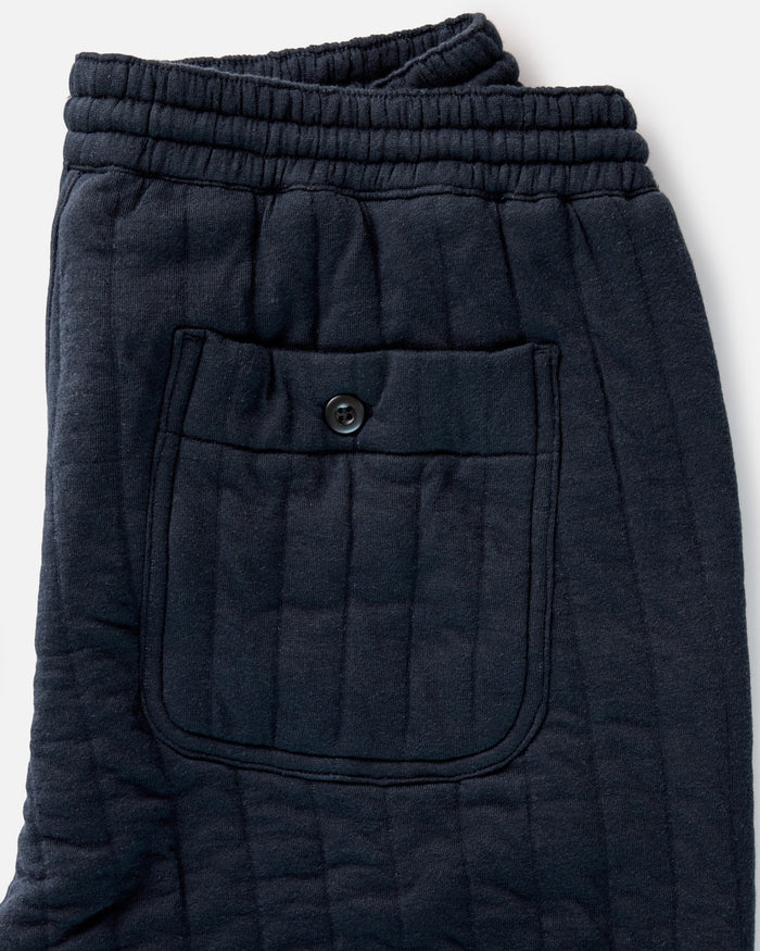 material shot of the waistband on The Quilted Apres Pant in Heather Midnight Jersey