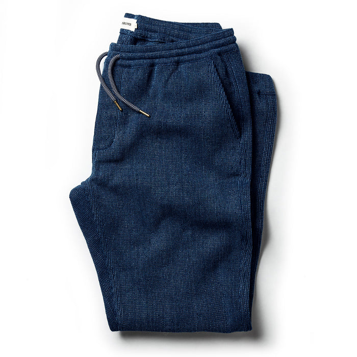 flatlay of The Apres Pant in Indigo Waffle folded