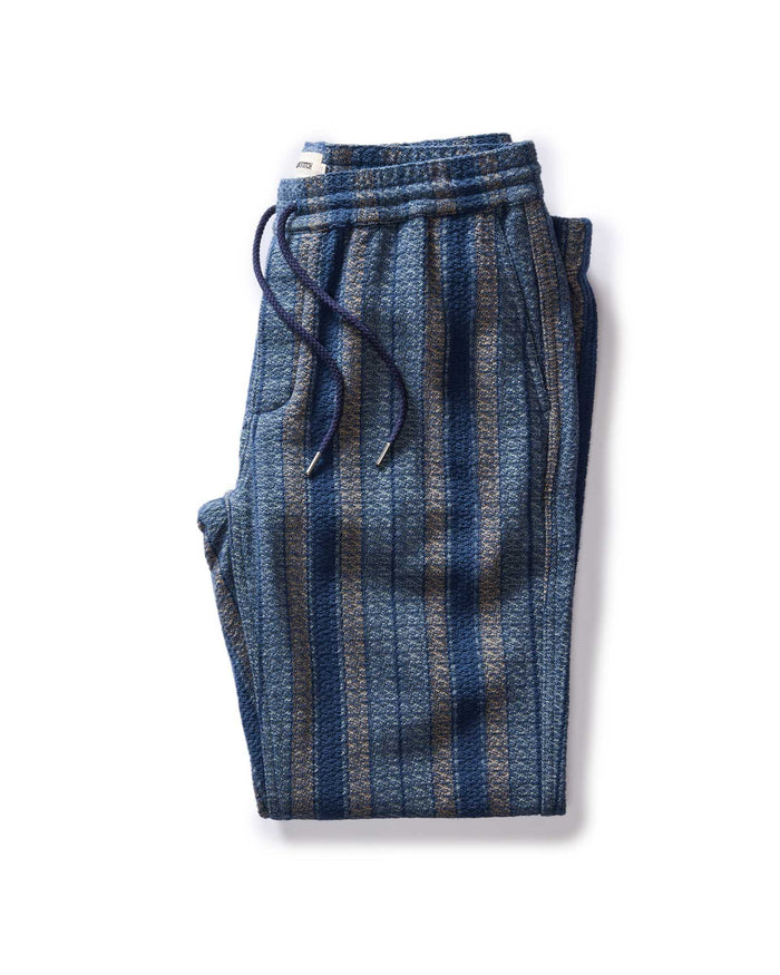 folded flatlay of the front of The Apres Pant in Marine Stripe