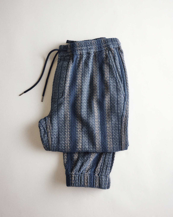 flatlay of The Apres Pant in Marine Stripe