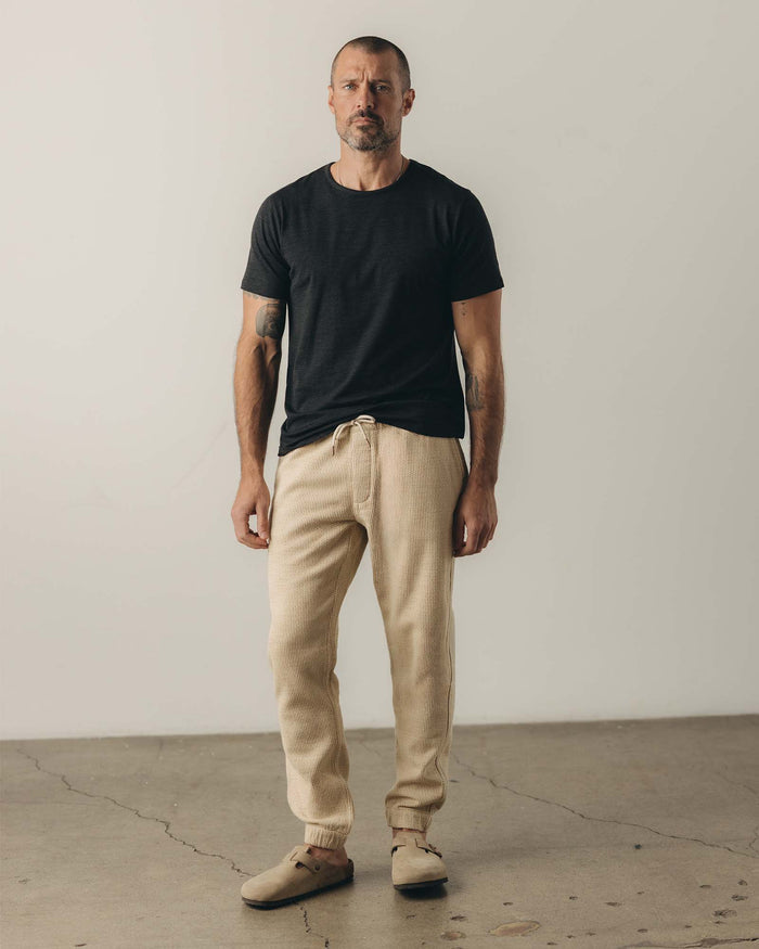 fit model posing in The Apres Pant in Natural Sashiko