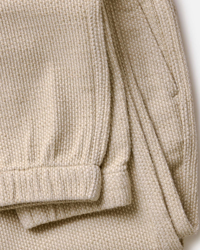 material shot of the band and drawstrings on The Apres Pant in Natural Sashiko