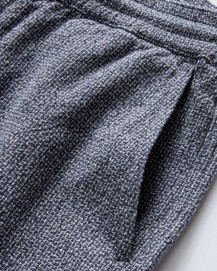 material shot of the front pockets on The Apres Pant in Navy Linen Tweed