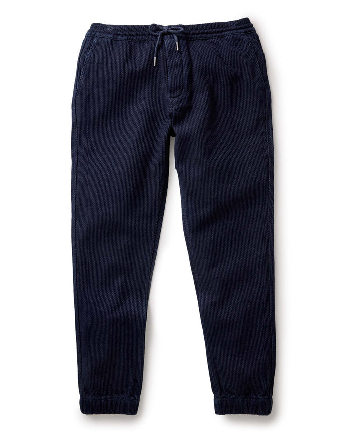 flatlay of The Apres Pant in Rinsed Indigo Sashiko