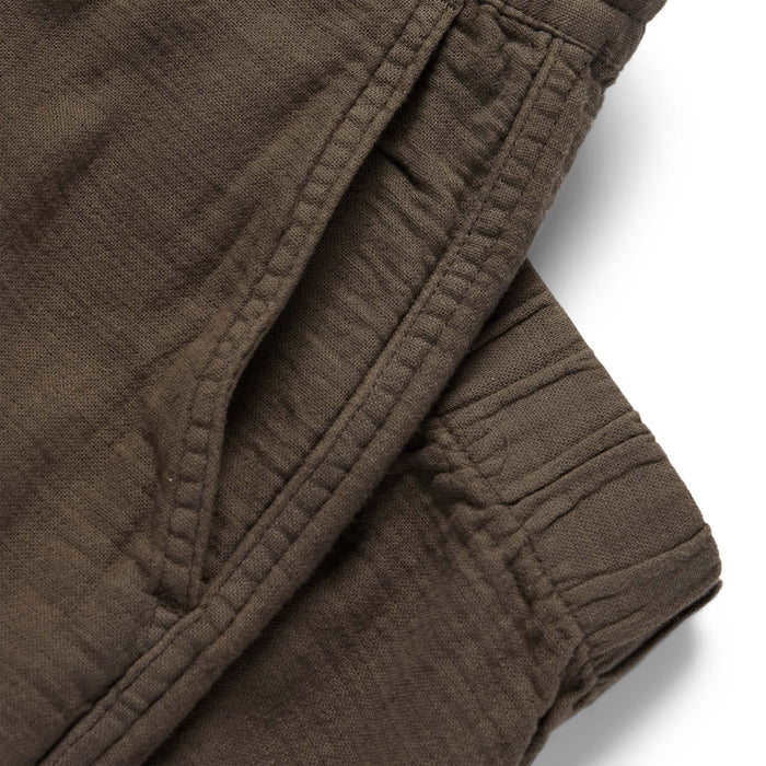 material shot of the pockets on The Apres Pant in Walnut Double Cloth