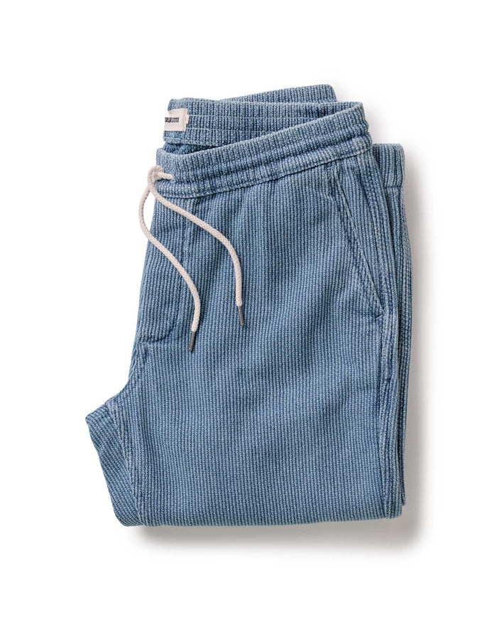 folded flatlay of The Apres Pant in Washed Indigo Sashiko