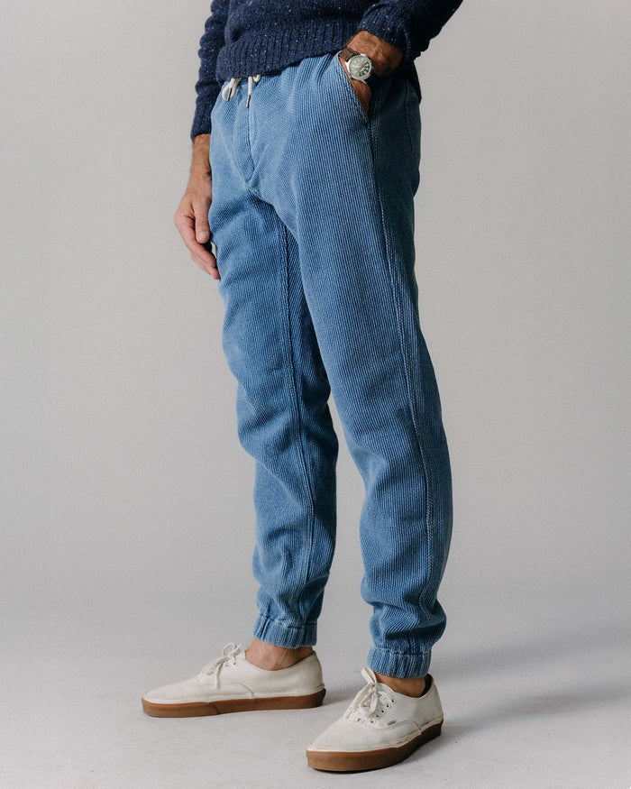 fit model with his hand in his pocket of The Apres Pant in Washed Indigo Sashiko