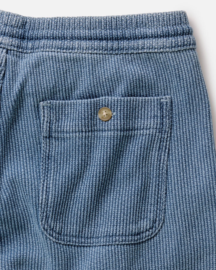 fit model standing wearing The Apres Pant in Washed Indigo Sashiko