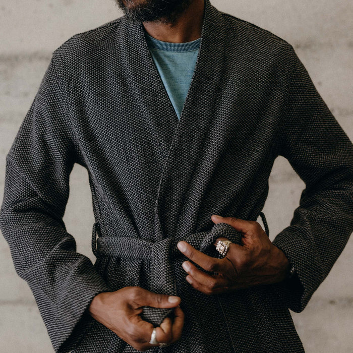 fit model tying The Apres Robe in Charcoal Sashiko