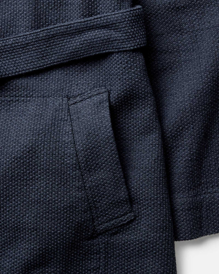 material shot of the pocket on The Apres Robe in Navy Sashiko