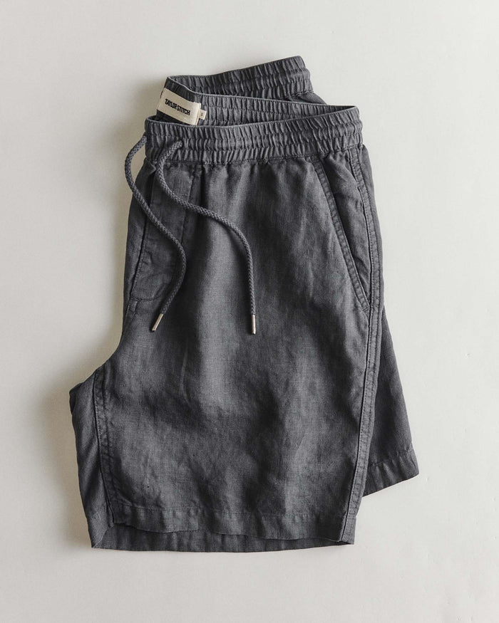 folded flatlay of The Apres Short in Faded Black Hemp