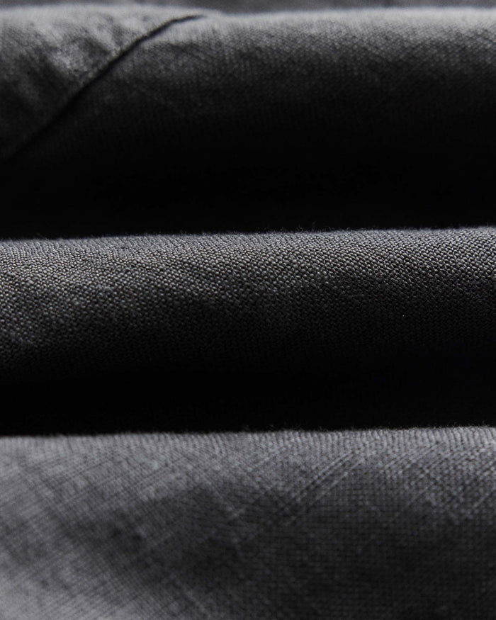 material shot of the fabric on The Apres Short in Faded Black Hemp