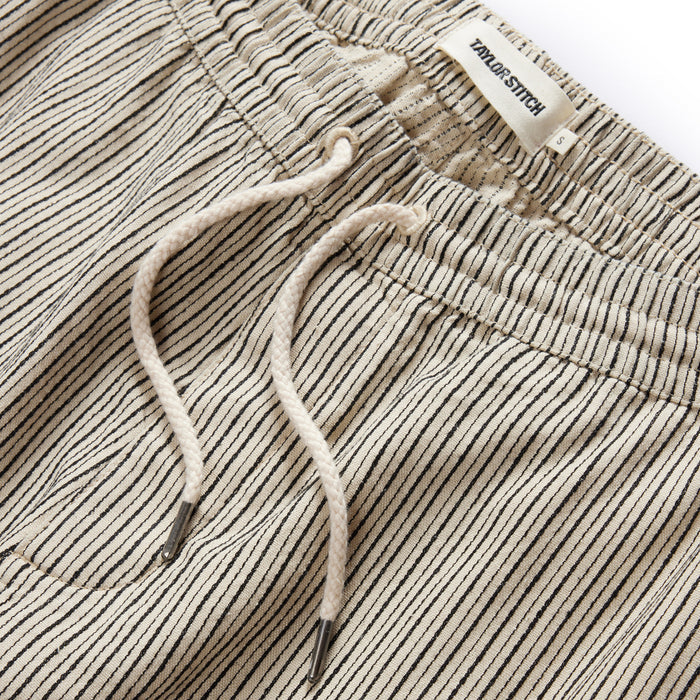 material shot of the drawcords on The Apres Short in Morita Stripe
