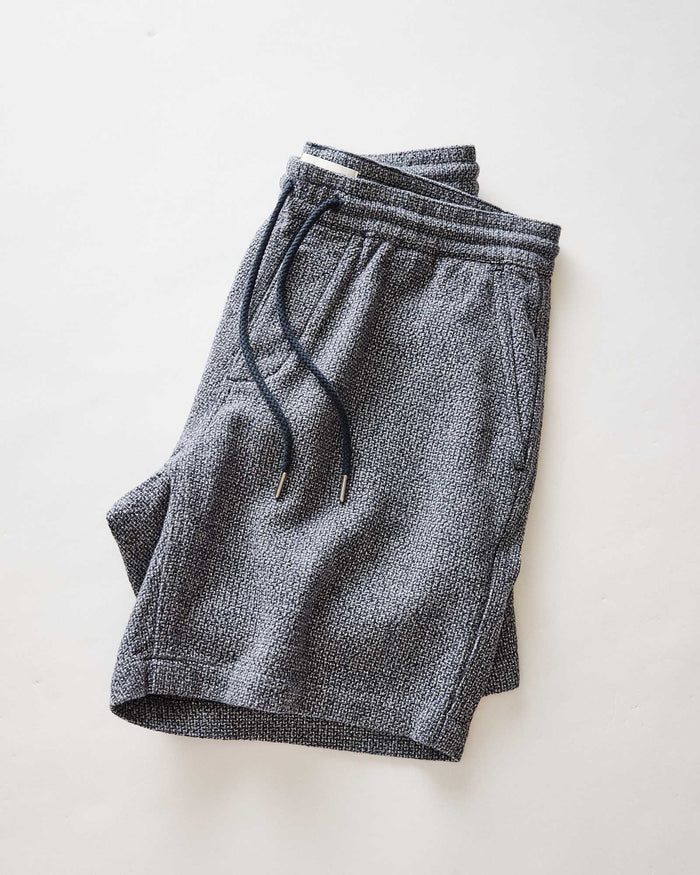flatlay of The Apres Short in Navy Linen Tweed folded
