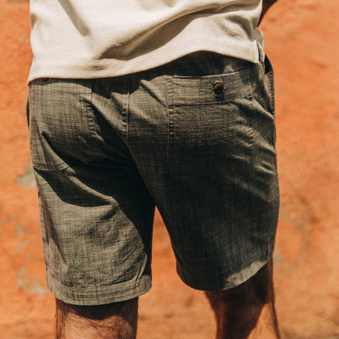 fit model wearing The Apres Short in Olive Pin Dot, back detail