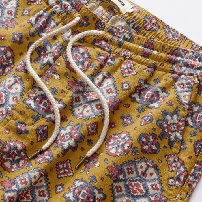 material shot of the waistband on The Apres Short in Tarnished Gold