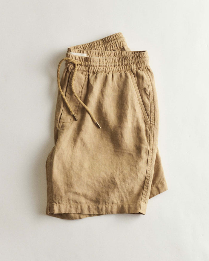 folded flatlay of The Apres Short in Wheat Hemp