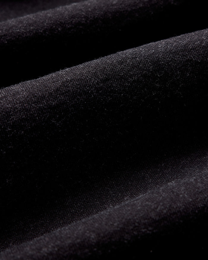 material shot of the fabric on The Apres Zip Hoodie in Black Indigo Terry