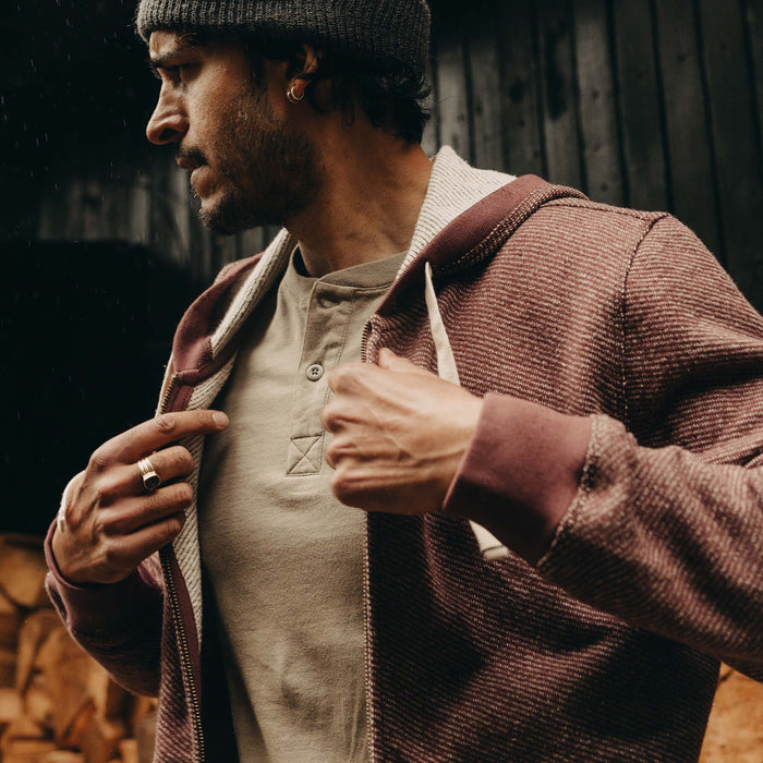 fit model adjusting The Apres Zip Hoodie in Merlot French Terry Twill