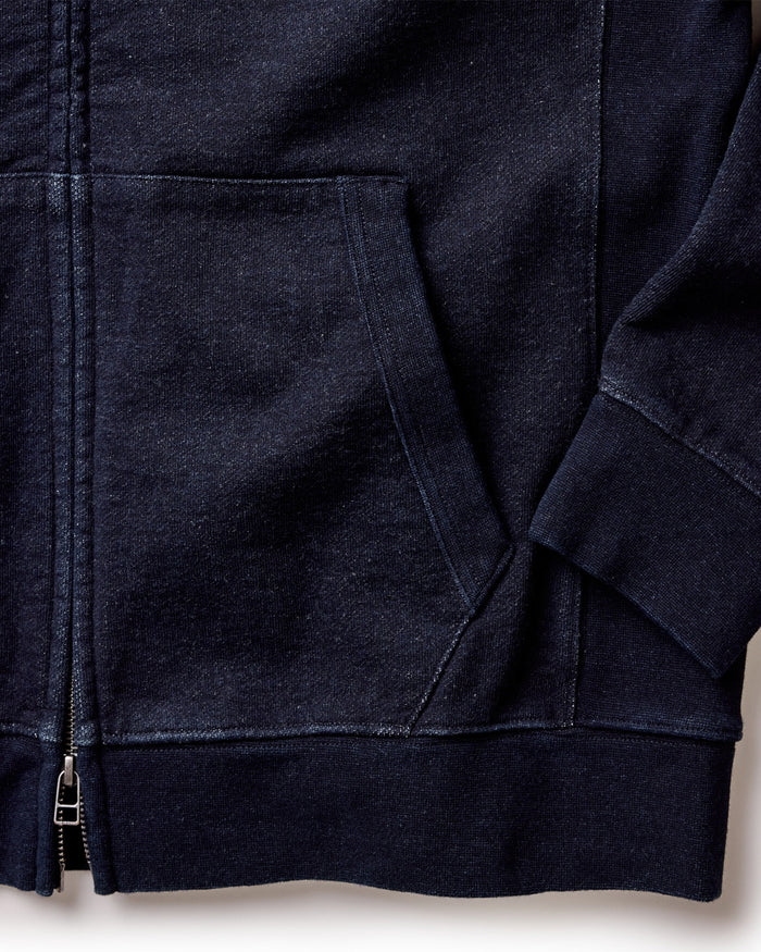 material shot of the pocket on The Apres Zip Hoodie in Rinsed Indigo Terry