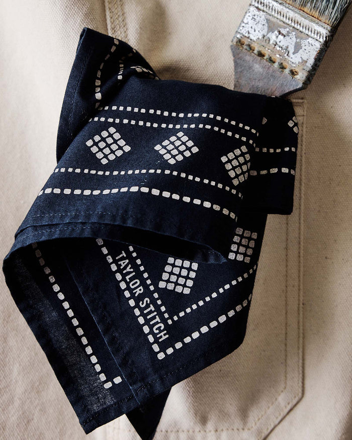 editorial image of The Bandana in Navy Diamond in a pants pocket