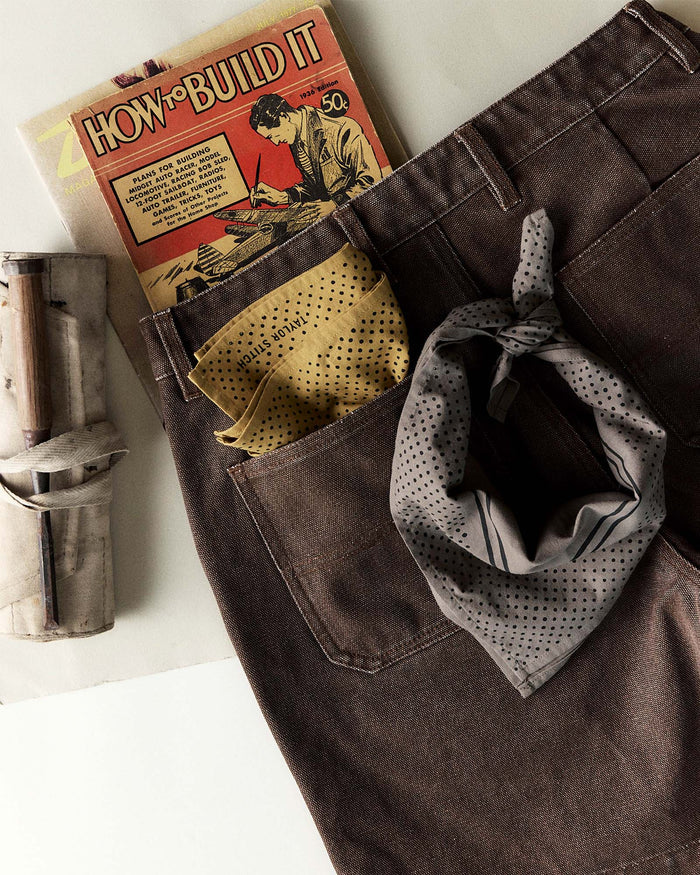 editorial image of The Bandana in Smoked Olive Pindot tied