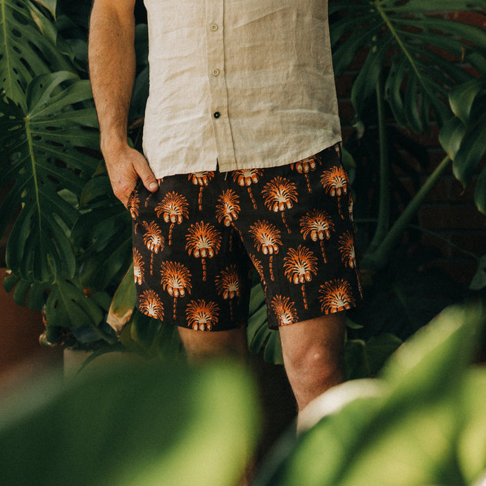 fit model wearing The Bayberry Trunk in Mirage Palm