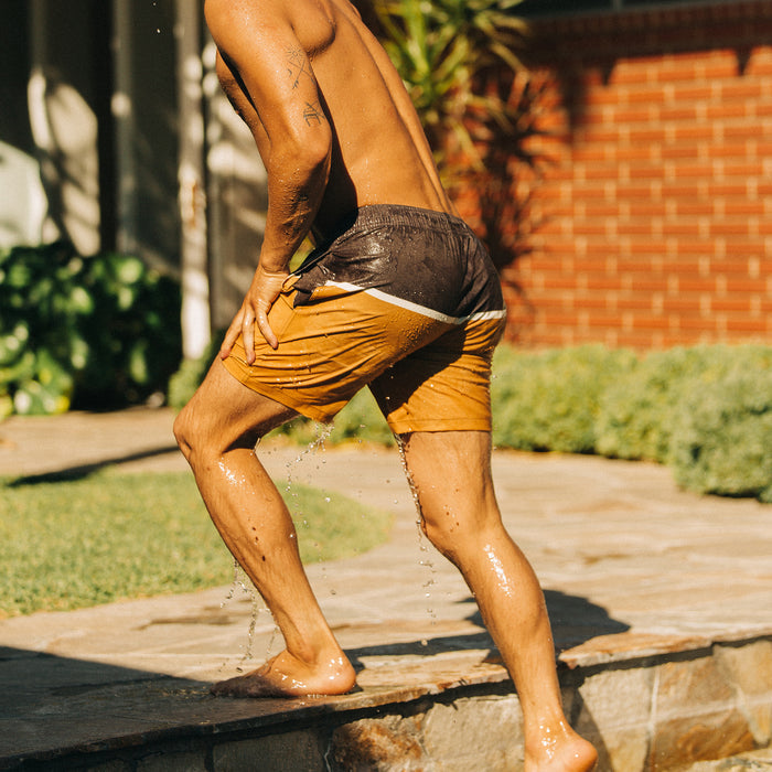 fit model showing the back of The Bayberry Trunk in Sandbar