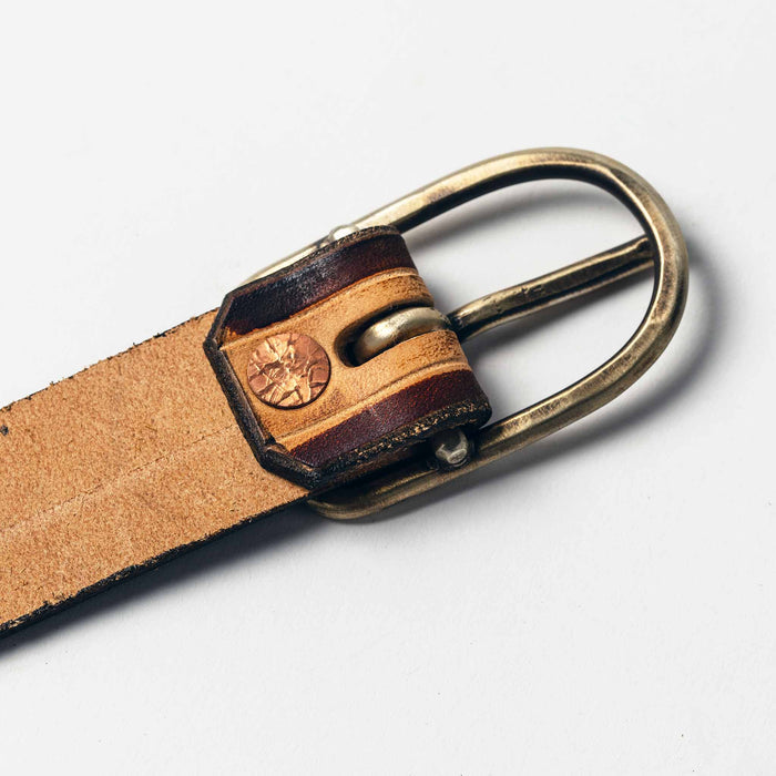 studio shot of The Stitched Belt in Cortado—buckle detail