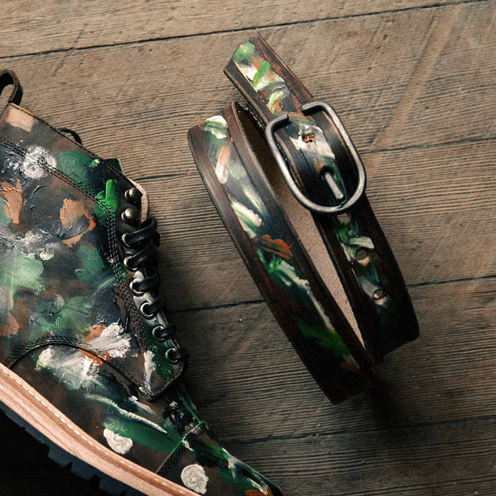 shot of The Stitched Belt in Jungle Stripe next to the trench boot