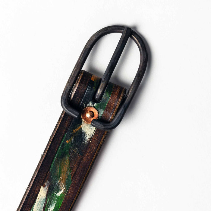 studio shot of the buckle of The Stitched Belt in Jungle Stripe