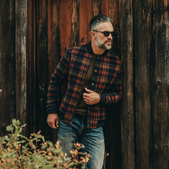 fit model wearing The Bomber Jacket in Navy Plaid Wool, looking right