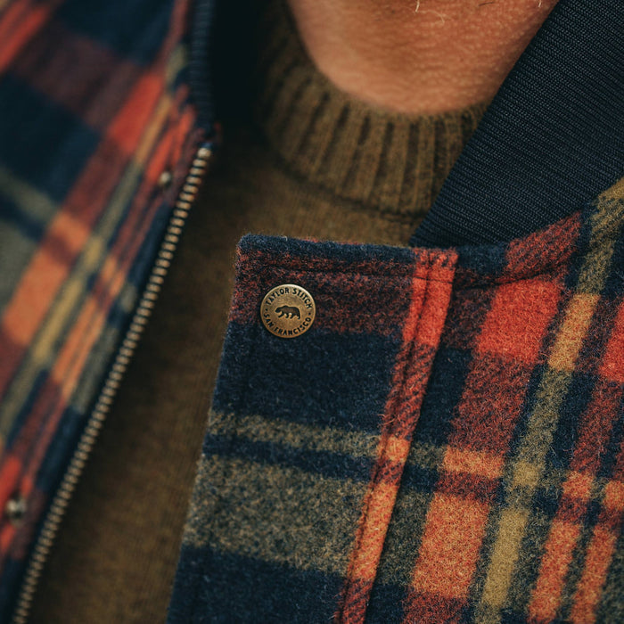 fit model wearing The Bomber Jacket in Navy Plaid Wool, button detail