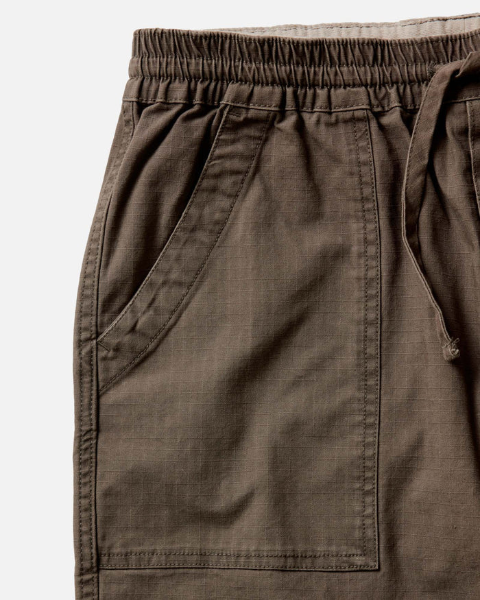 fit model walking in The Breakwater Pant in Mushroom Ripstop