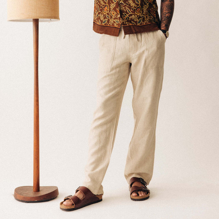 fit model with his hand in the pocket of The Breakwater Pant in Natural Herringbone