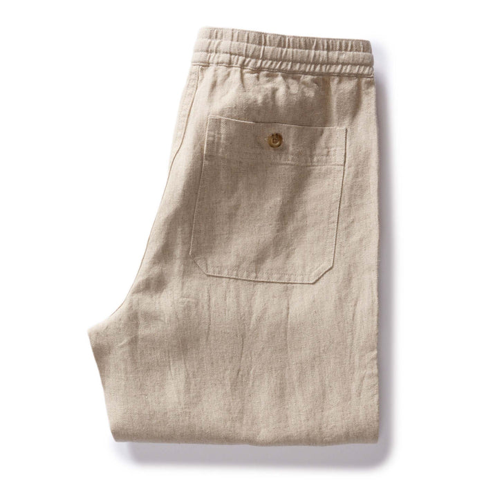 folded flatlay of the back of The Breakwater Pant in Natural Herringbone