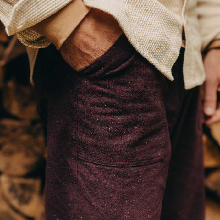 fit model with his hands in his pockets wearing The Breakwater Pant in Nutmeg Donegal