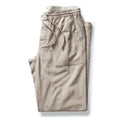 folded flatlay of The Breakwater Pant in Oat Donegal