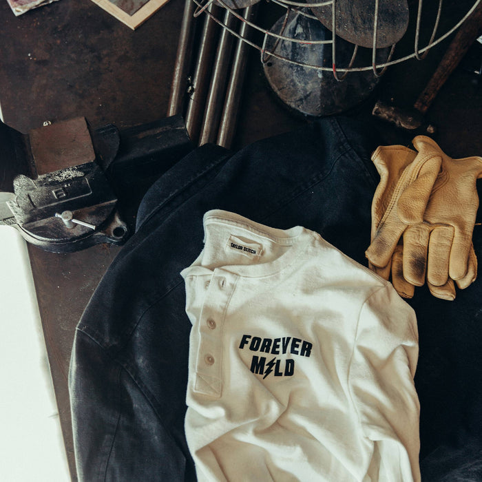 textural shot of The Brother Moto Heavy Bag Henley in Forever Mild