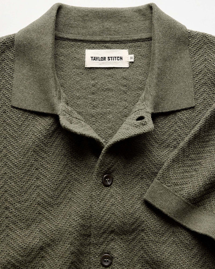 material shot of the collar on The Button Down Polo in Cilantro Herringbone