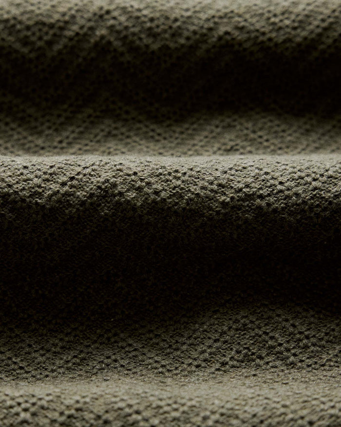 material shot of the fabric texture on The Button Down Polo in Cilantro Herringbone
