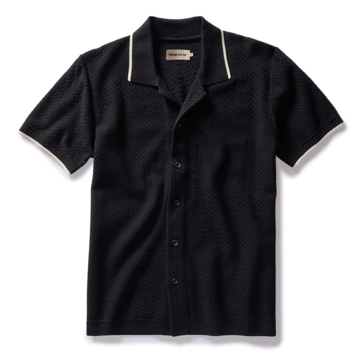 flatlay of The Button Down Polo in Coal Herringbone